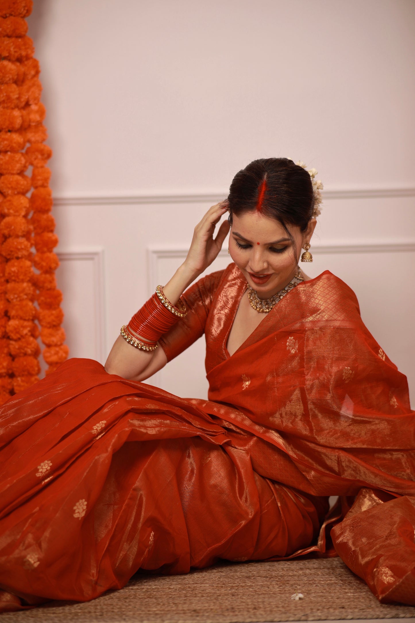 Red maheshwari tissue silk saree with flower motifs all over