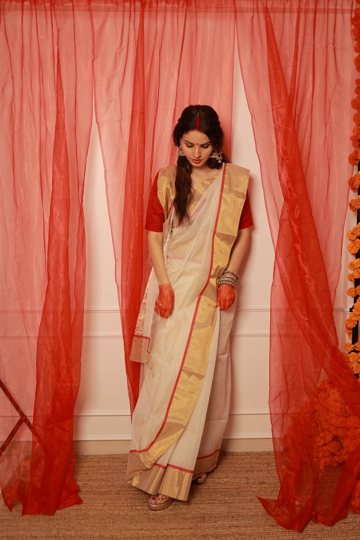 Off white & red maheshwari saree with zari lines on pallu