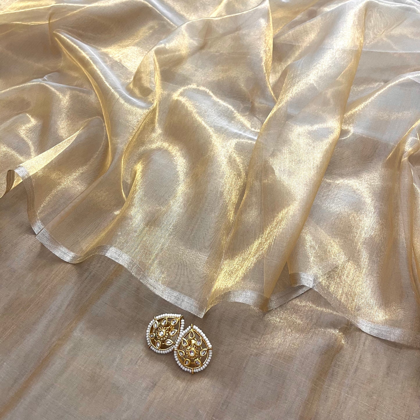 (Shop the look) Molten gold chanderi tissue silk saree with zari lines on pallu