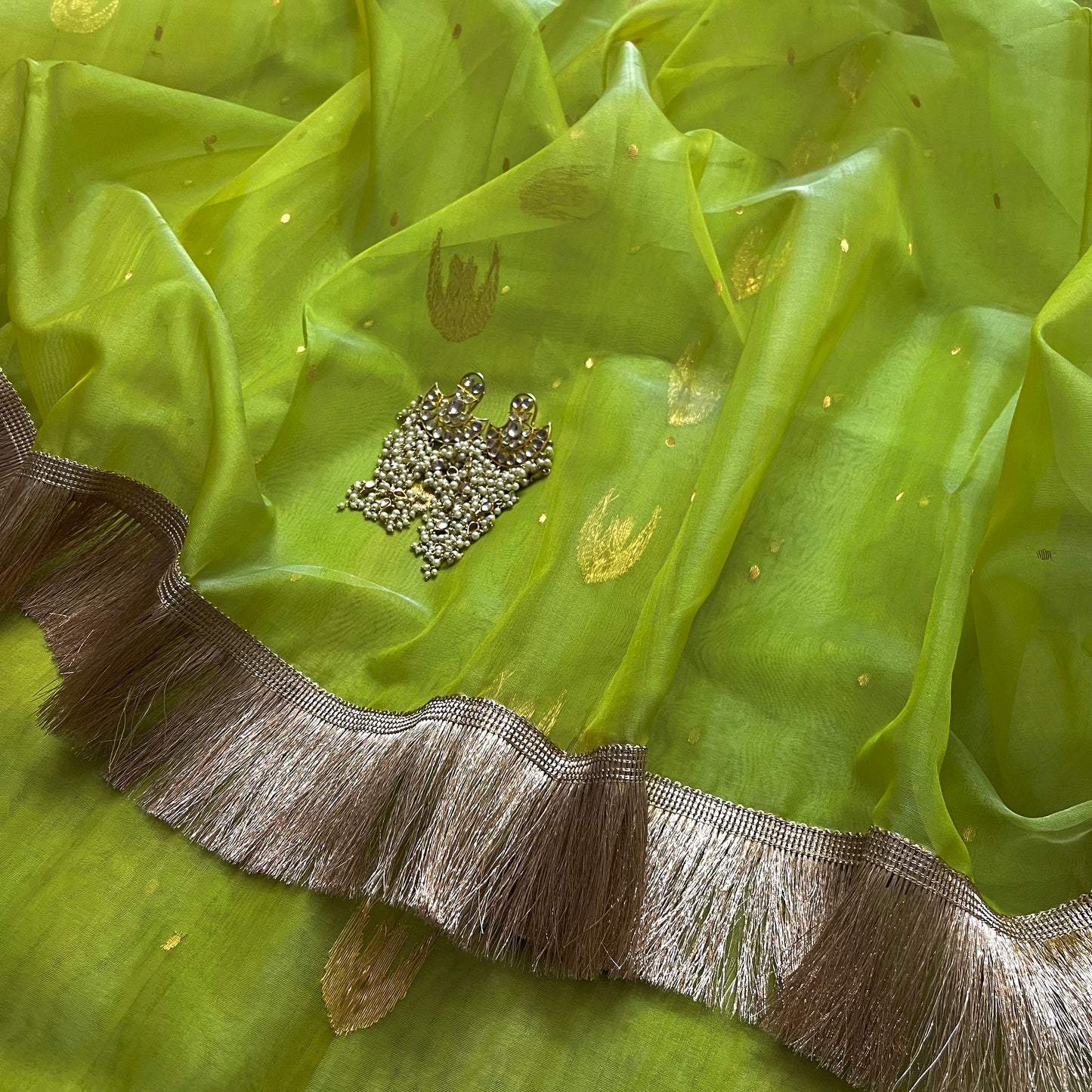 Tropical green chanderi silk saree with zari bootis and chaand bootis all over