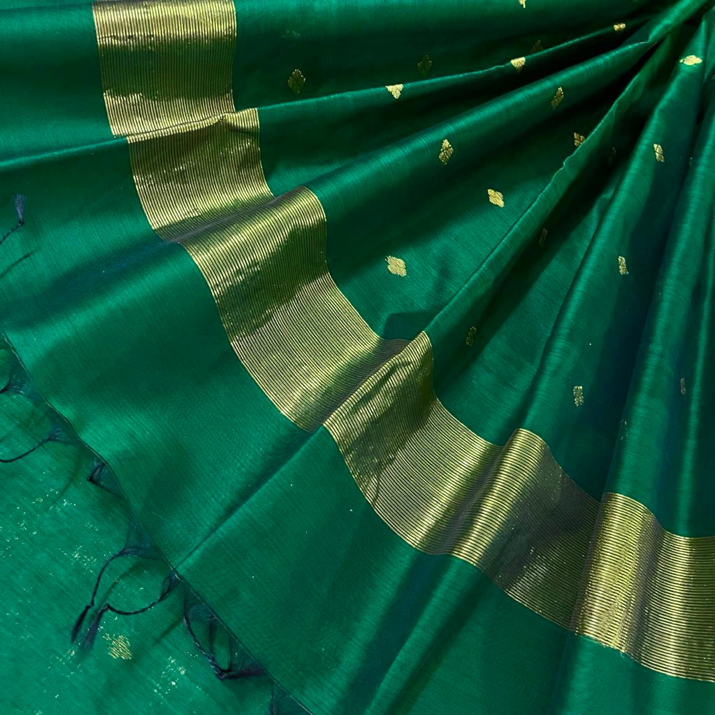 Dark green maheshwari saree with zari bootis all over