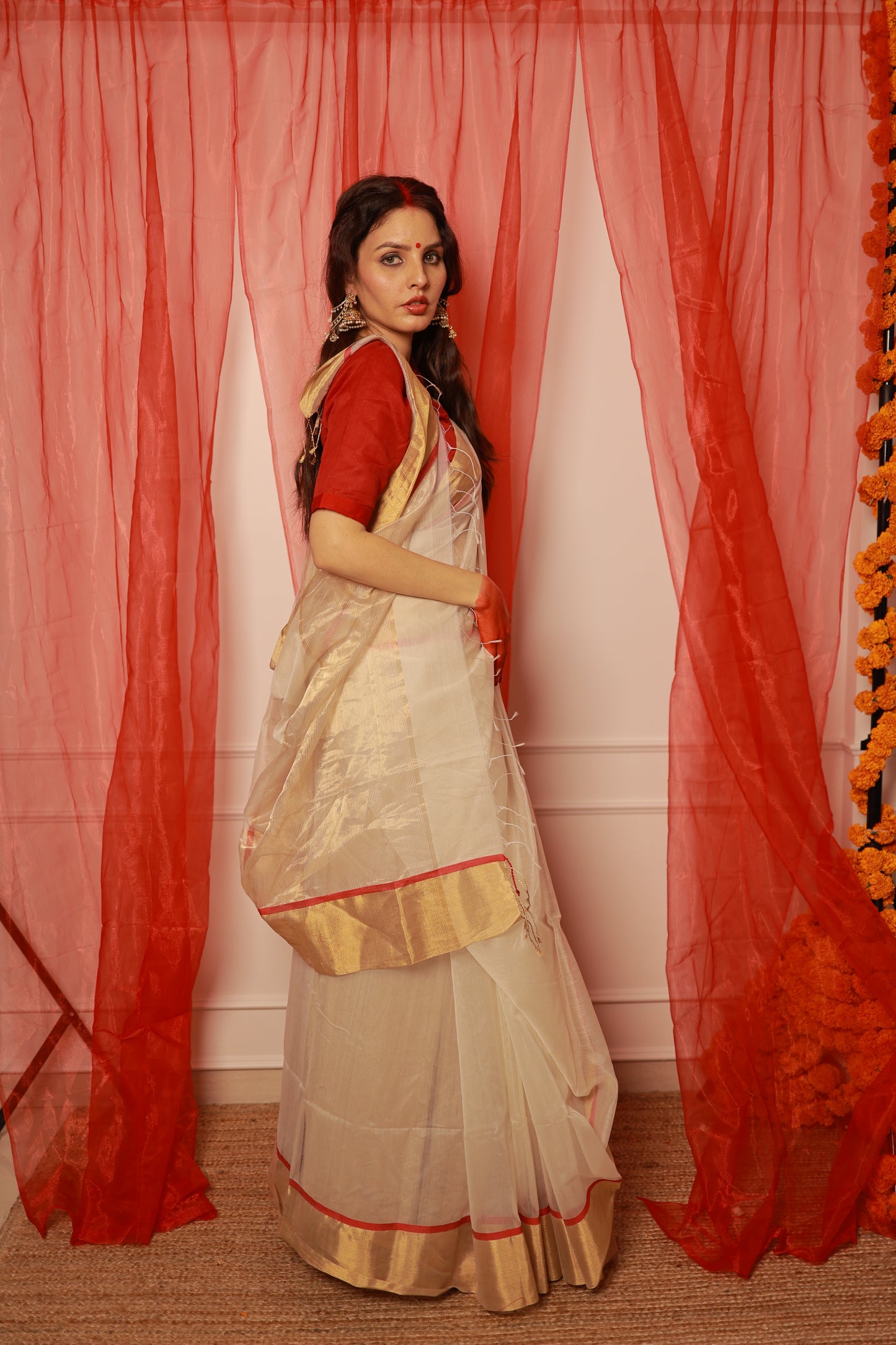 Off white & red maheshwari saree with zari lines on pallu