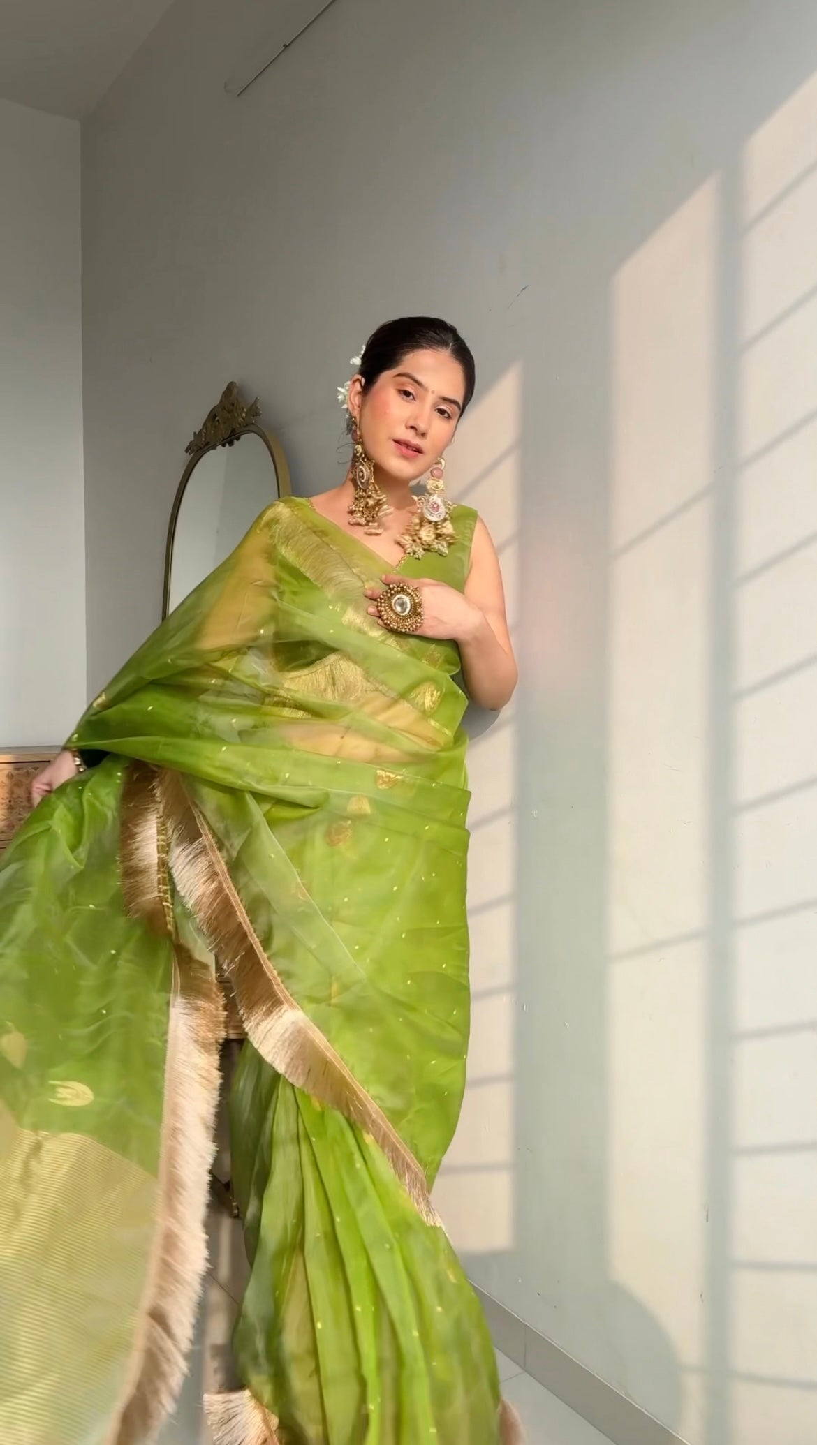 Tropical green chanderi silk saree with zari bootis and chaand bootis all over