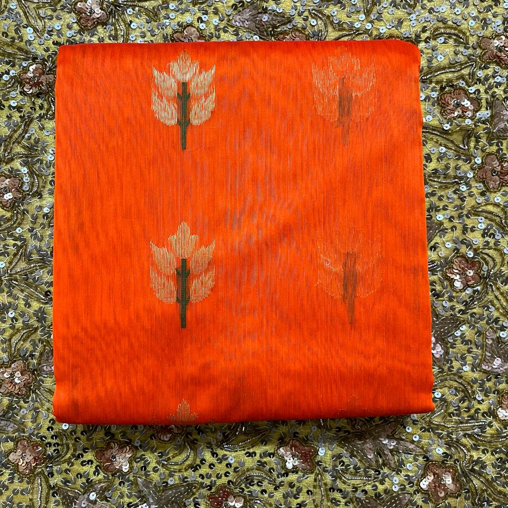 Orange Chanderi saree with flower motifs all over