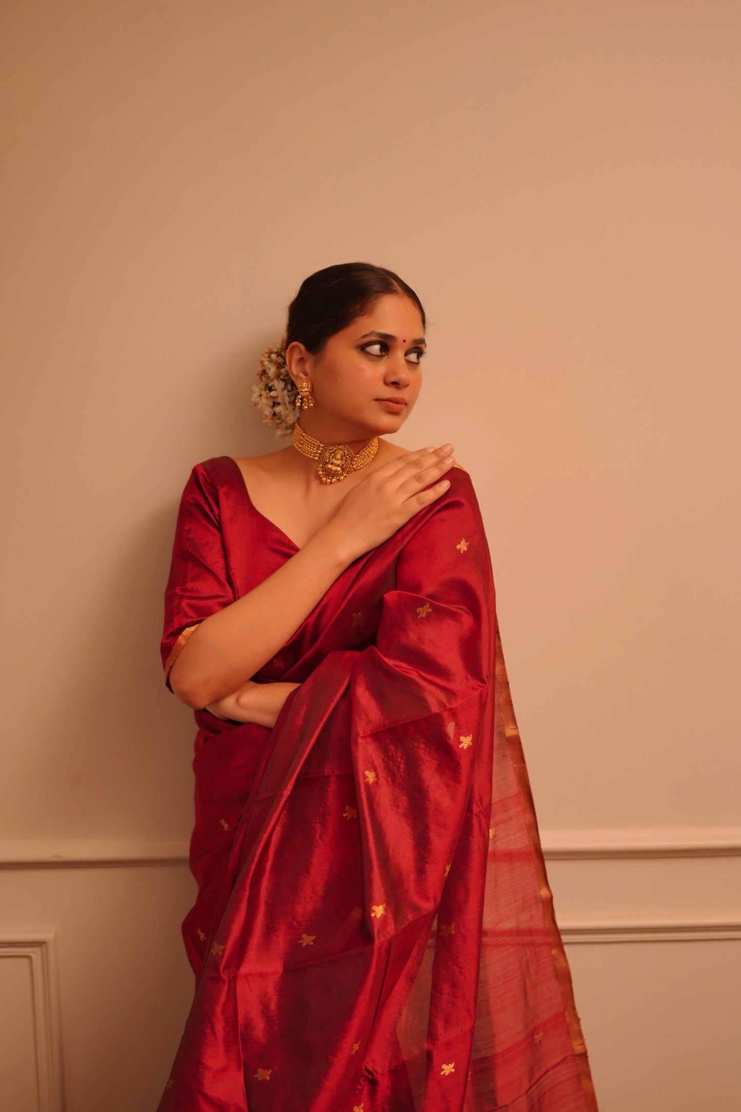 Deep maroon chanderi silk saree with flower bootis all over