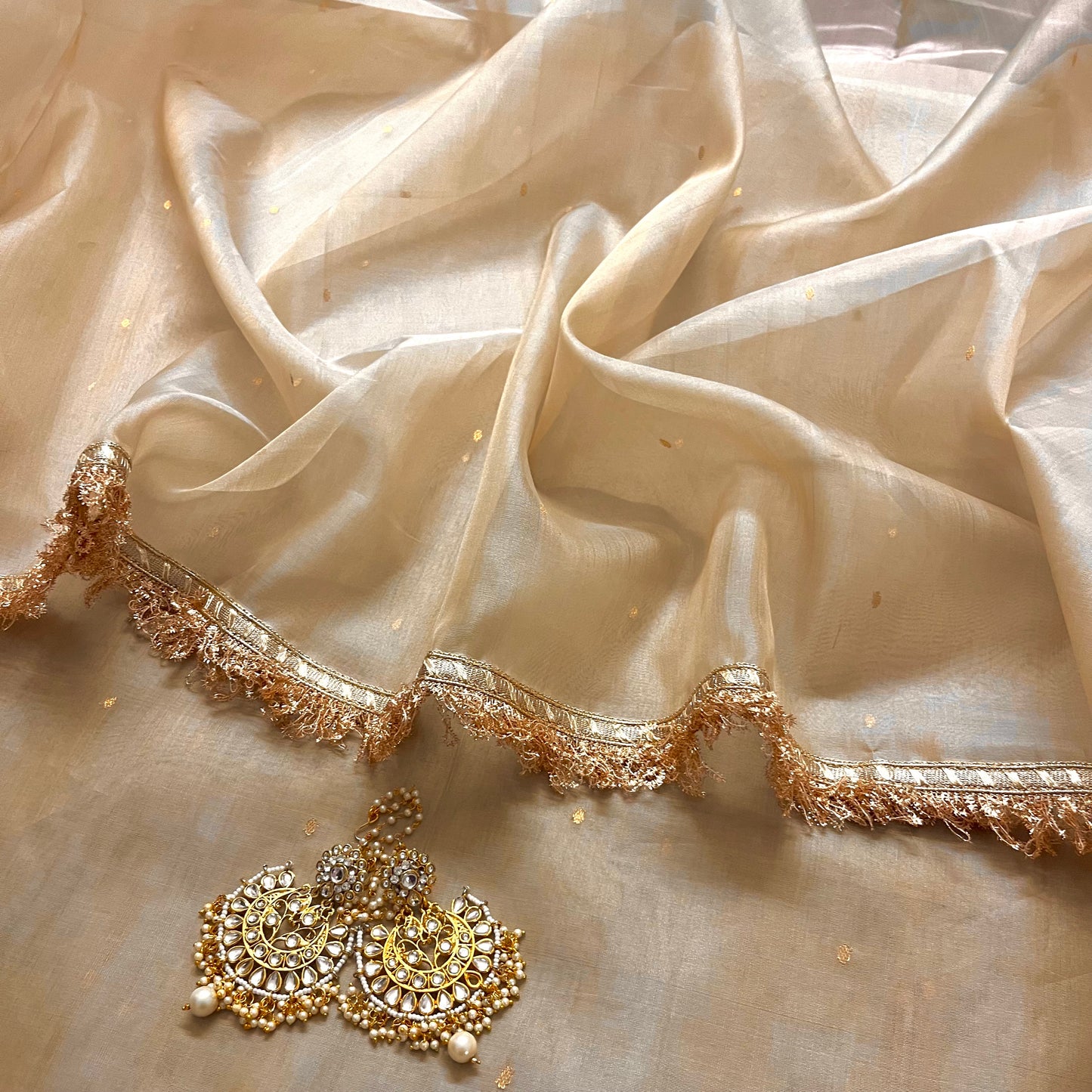 Beige gold Chanderi organza silk saree with zari bootis all over