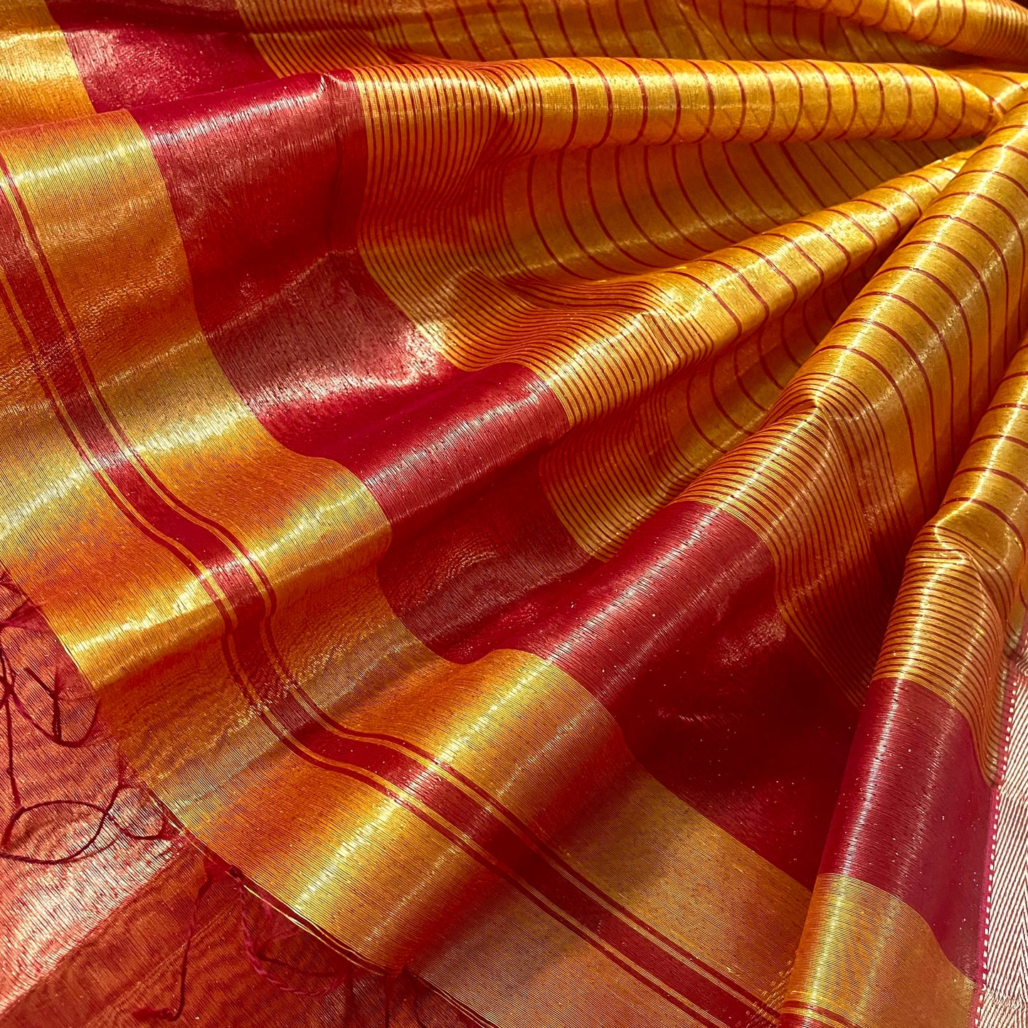 Mustard and red maheshwari tissue silk saree with zari pattern on pallu