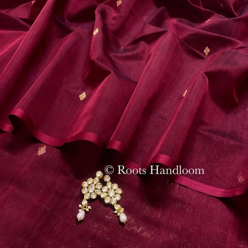 Deep maroon Maheshwari saree with zari bootis all over