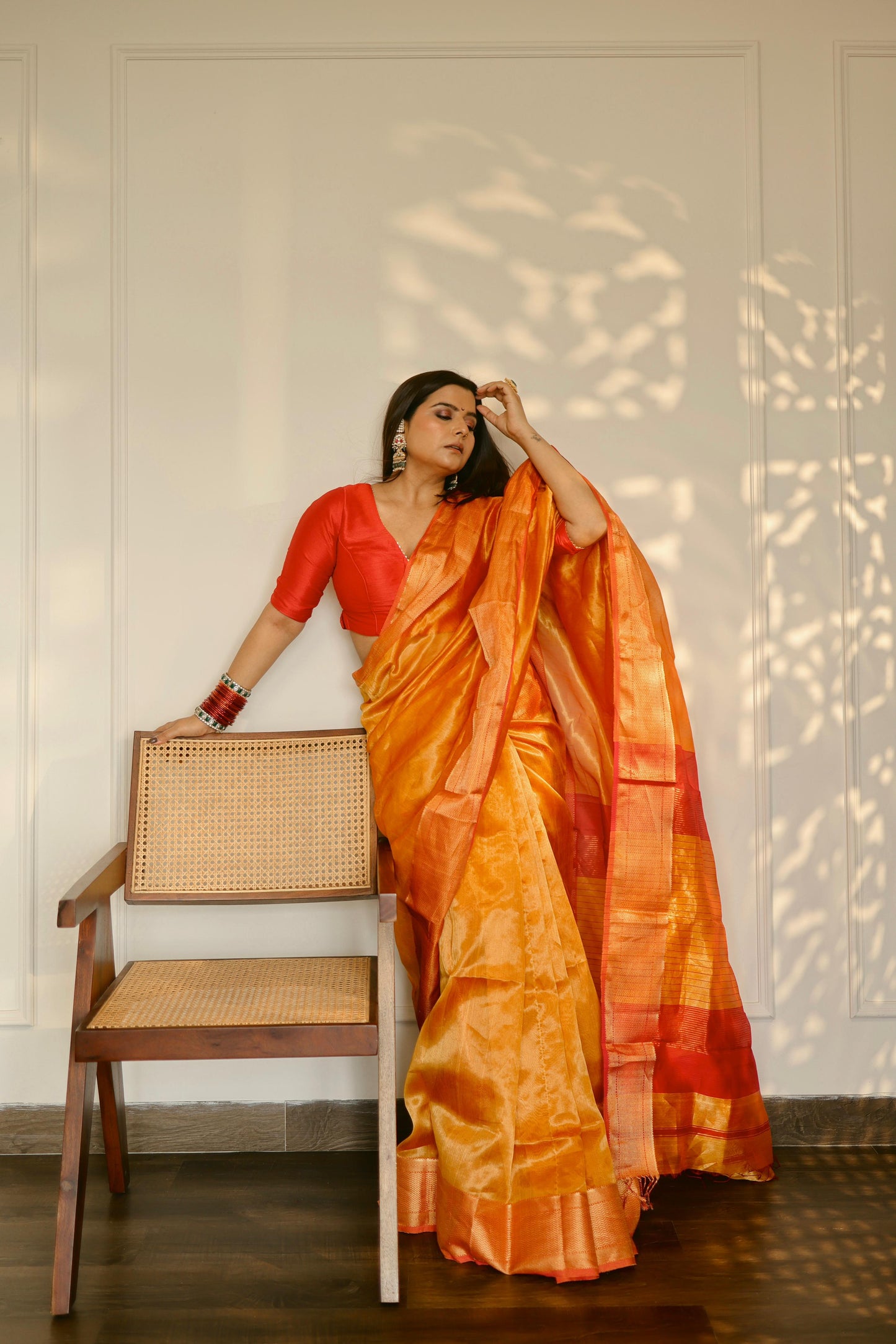 Mustard and red maheshwari tissue silk saree with zari pattern on pallu