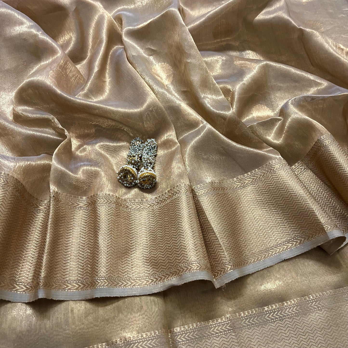 Hazelnut gold maheshwari tissue silk saree with flower motifs all over