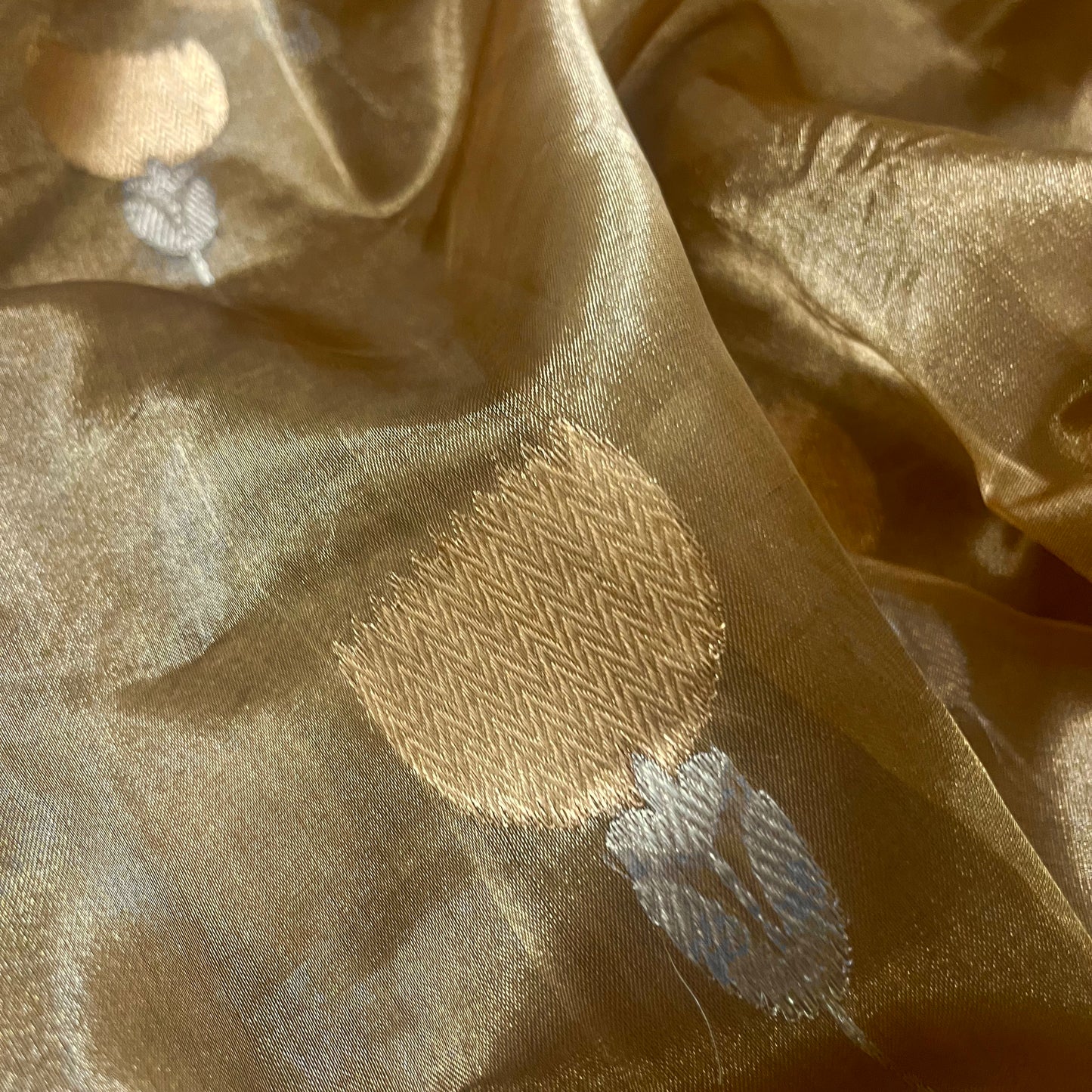 Antique gold Banarasi tissue silk saree with flower motifs all over