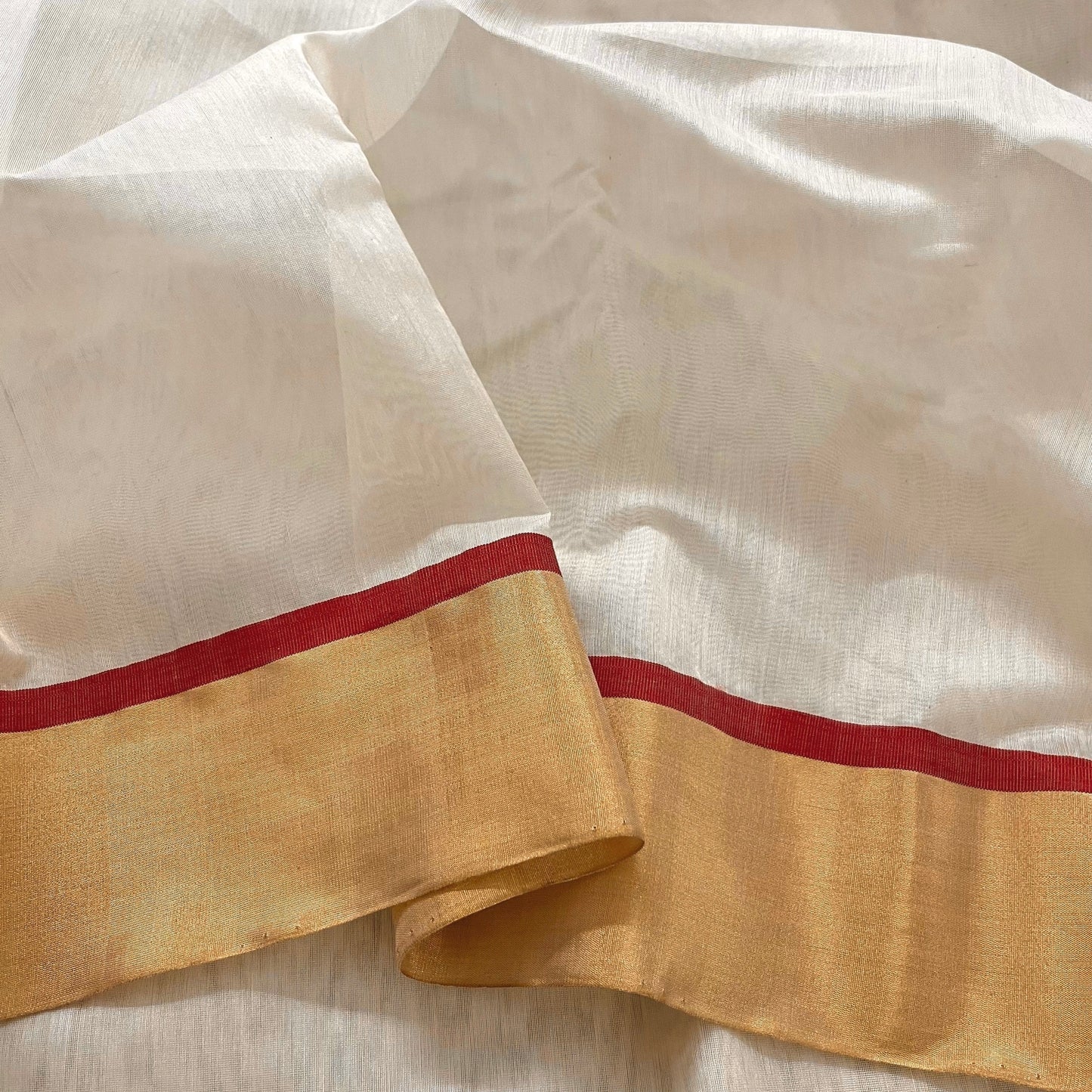 Off white & red maheshwari saree with zari lines on pallu