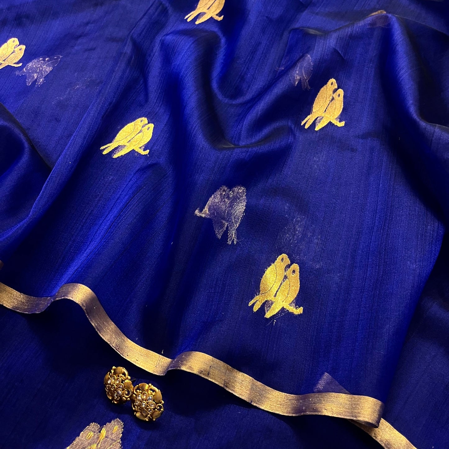 Midnight blue chanderi organza silk saree with bird motifs all over