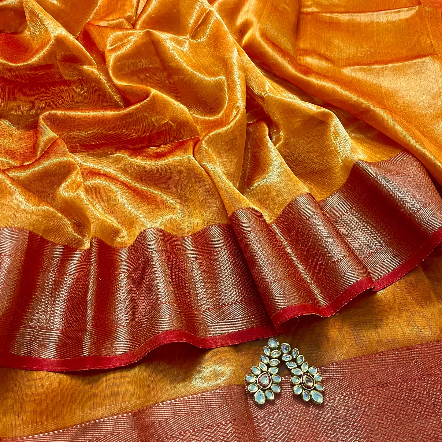 Mustard and red maheshwari tissue silk saree with zari pattern on pallu