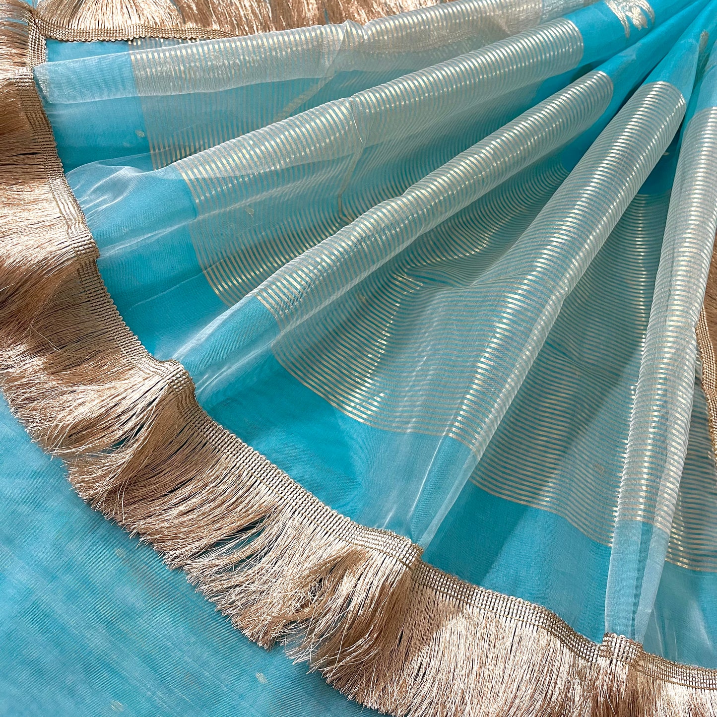 Aqua blue chanderi organza silk saree with zari bootis and chaand bootis all over