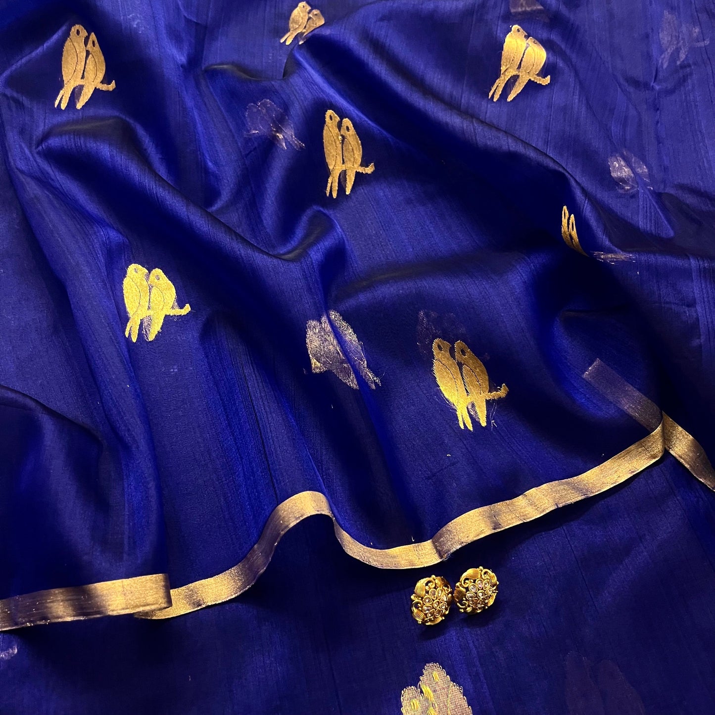 Midnight blue chanderi organza silk saree with bird motifs all over