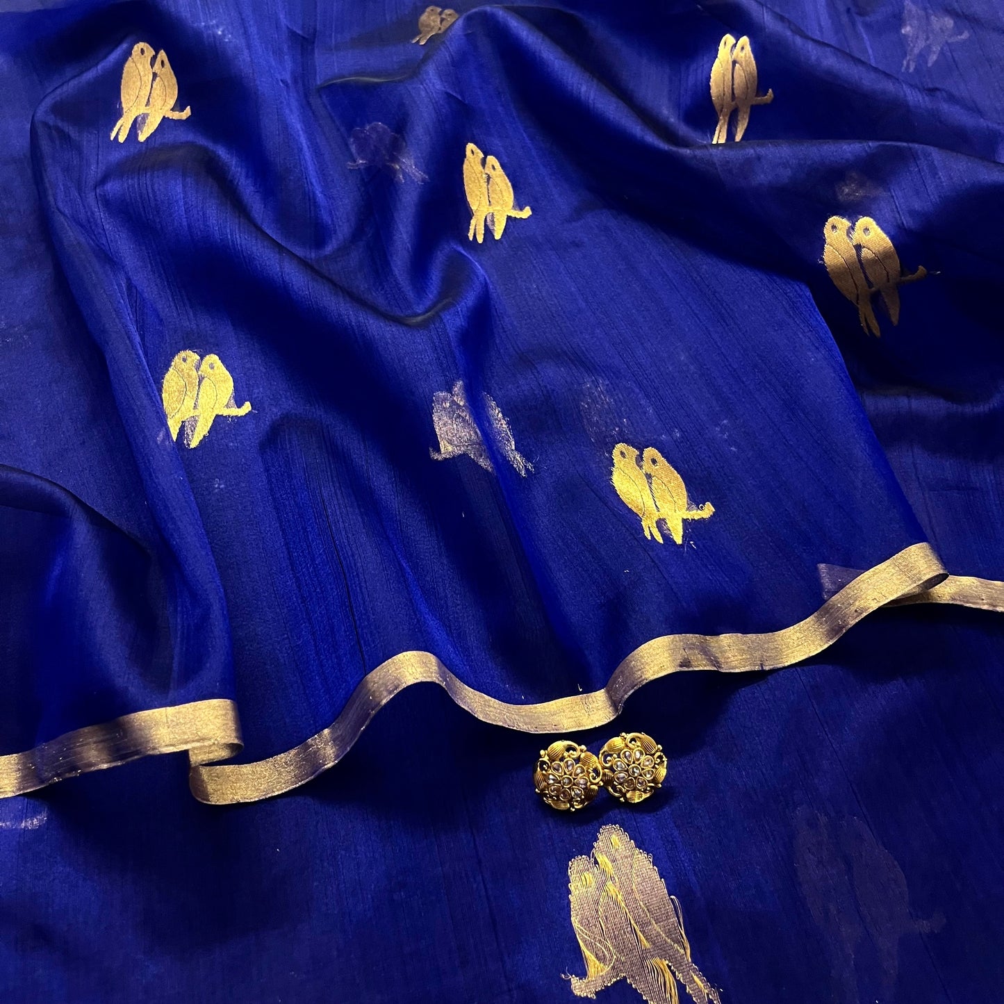 Midnight blue chanderi organza silk saree with bird motifs all over