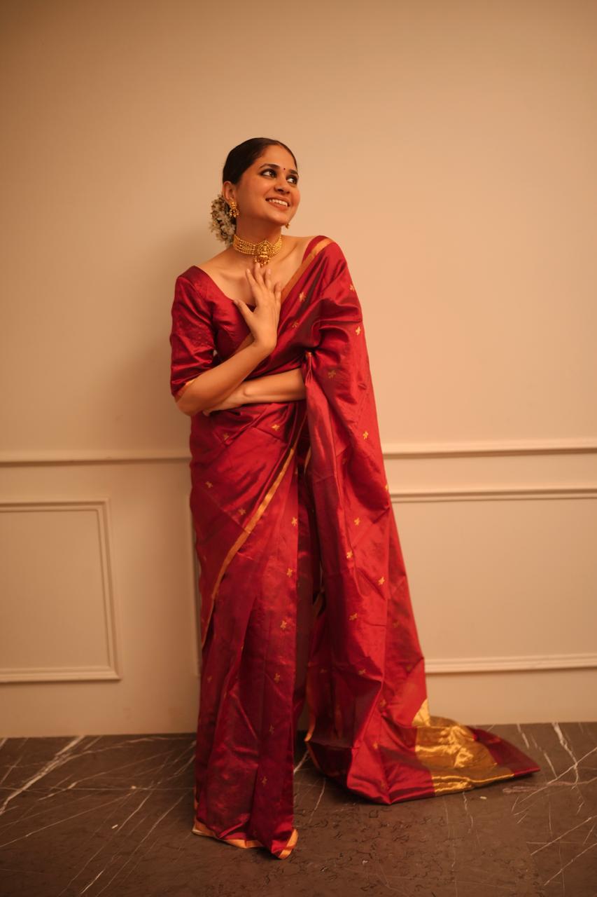 Deep maroon chanderi silk saree with flower bootis all over