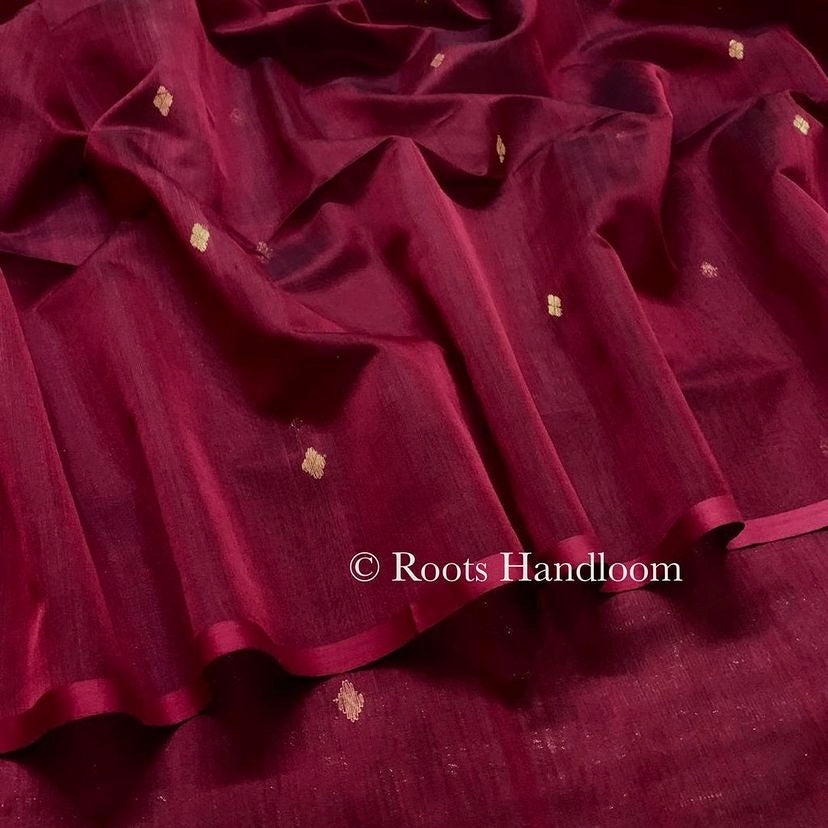 Deep maroon Maheshwari saree with zari bootis all over