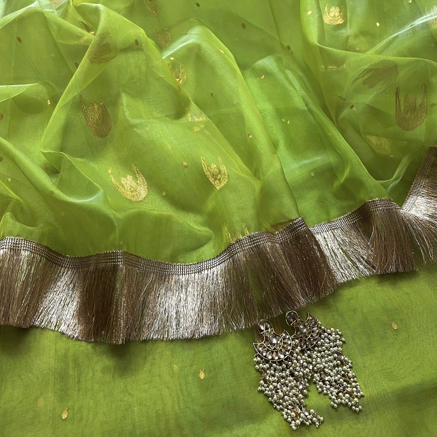 Tropical green chanderi silk saree with zari bootis and chaand bootis all over