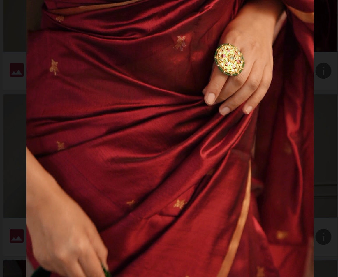 Deep maroon chanderi silk saree with flower bootis all over