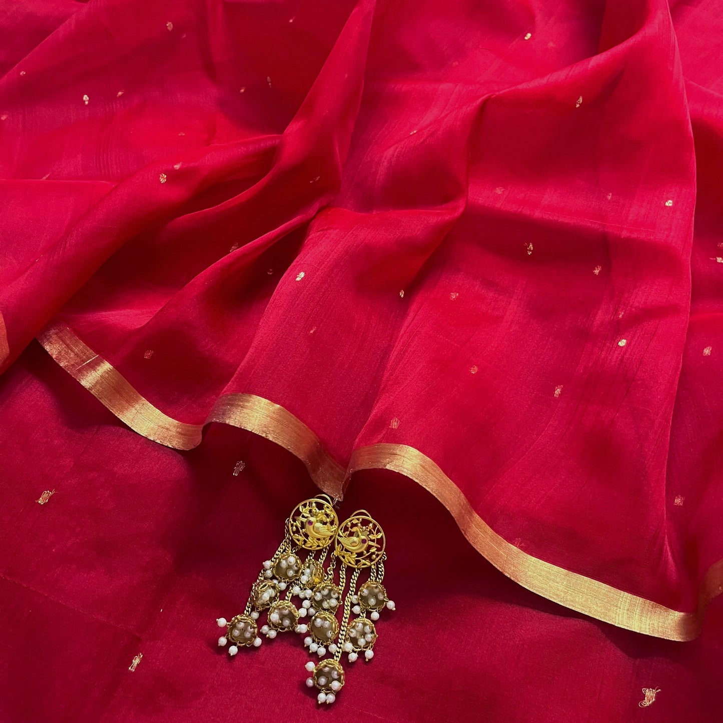 Deep red chanderi organza silk saree with zari bootis all over