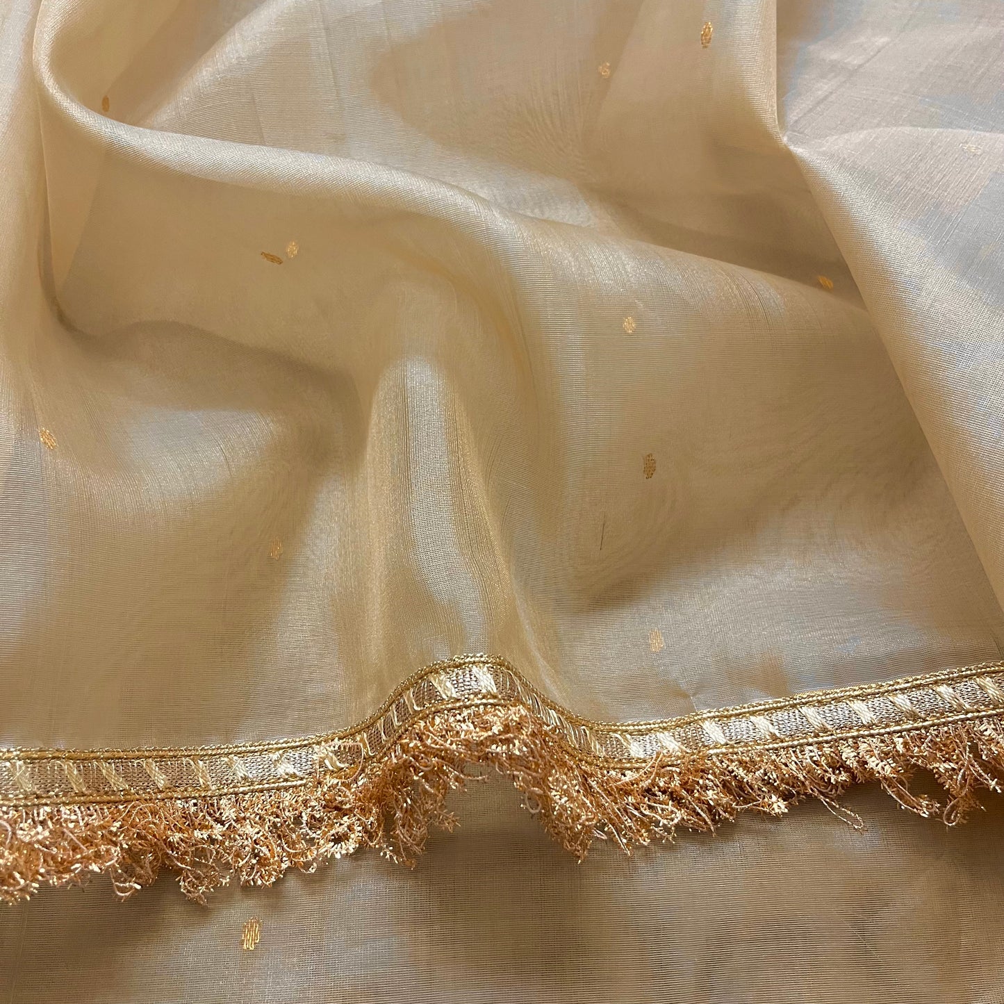 Beige gold Chanderi organza silk saree with zari bootis all over