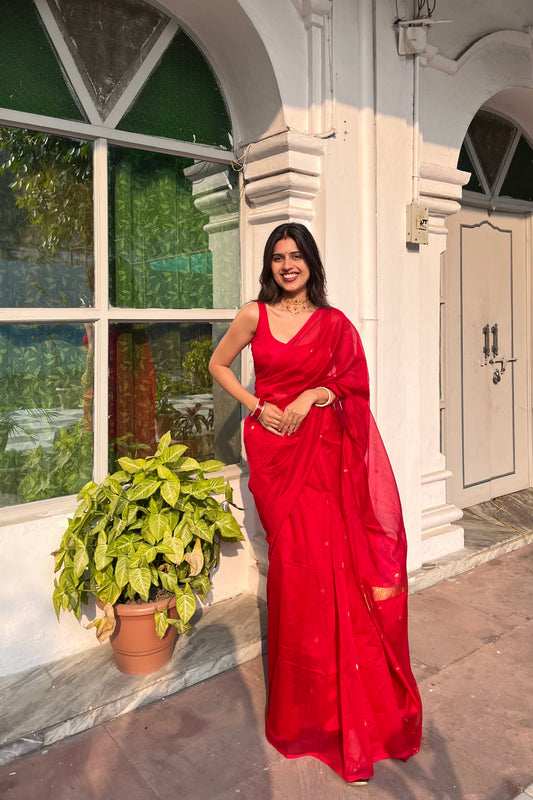 Deep red maheshwari saree with zari bootis all over