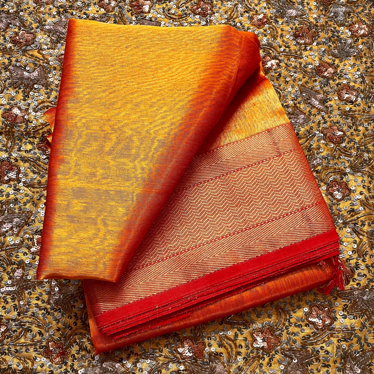 Mustard and red maheshwari tissue silk saree with zari pattern on pallu