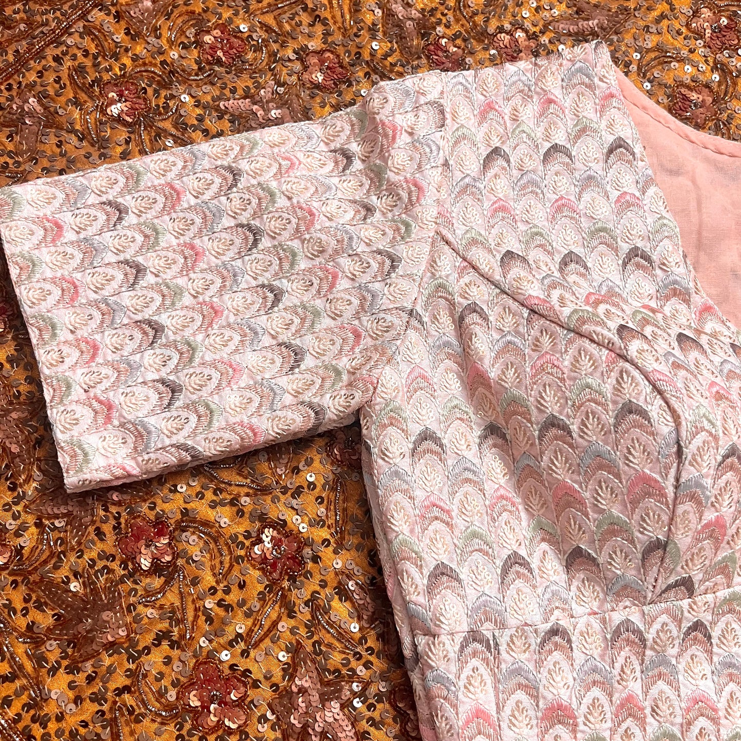 Light pink blouse with threadwork