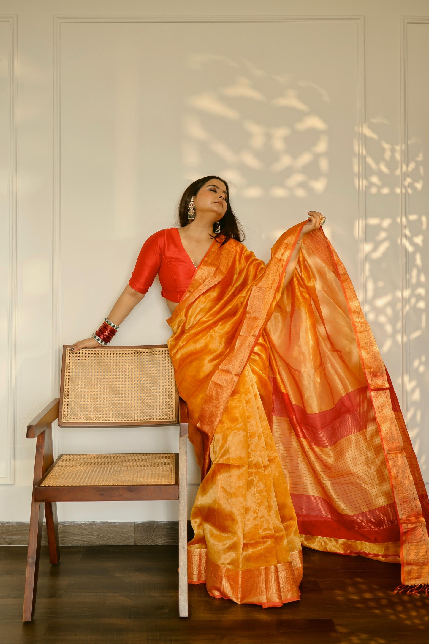 Mustard and red maheshwari tissue silk saree with zari pattern on pallu