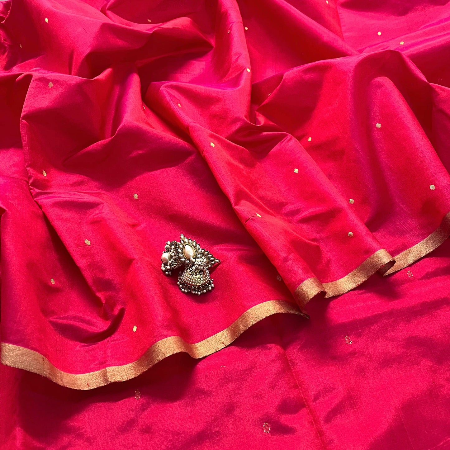 Crimson red chanderi silk saree with zari bootis all over