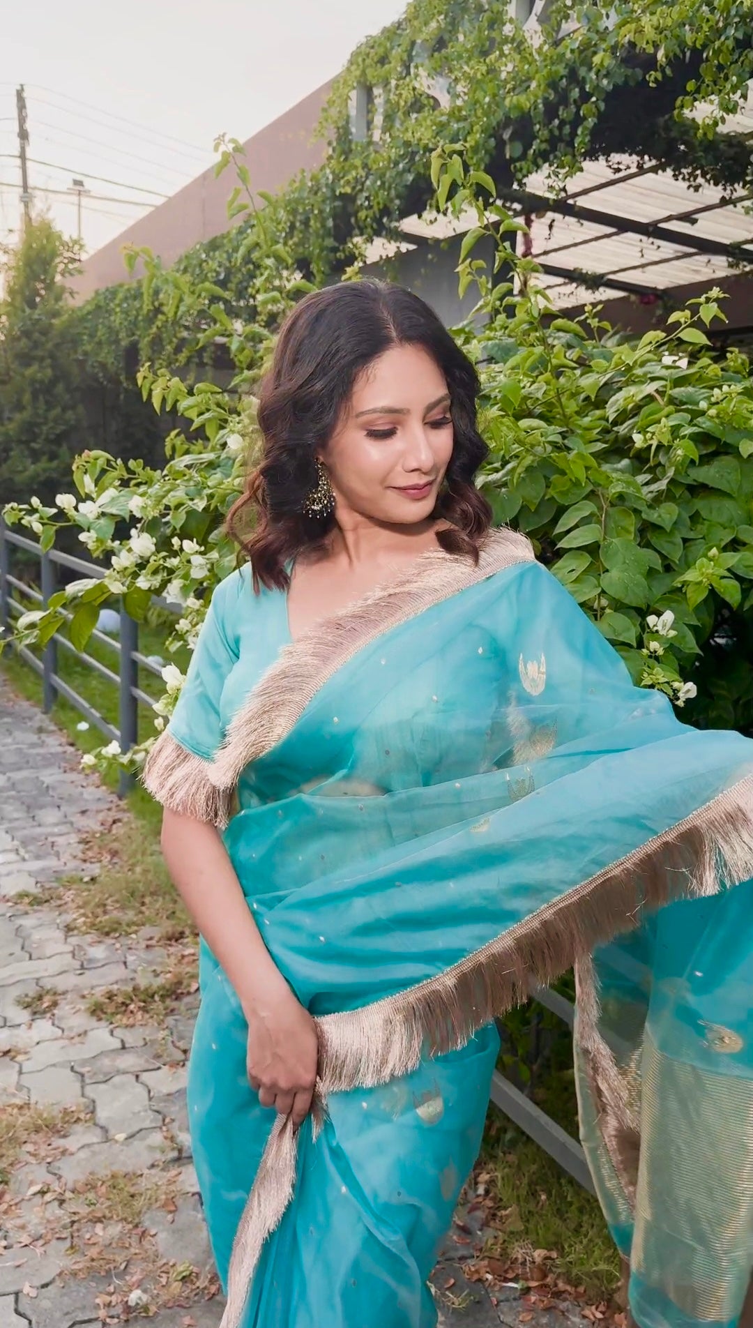 Aqua blue chanderi organza silk saree with zari bootis and chaand bootis all over