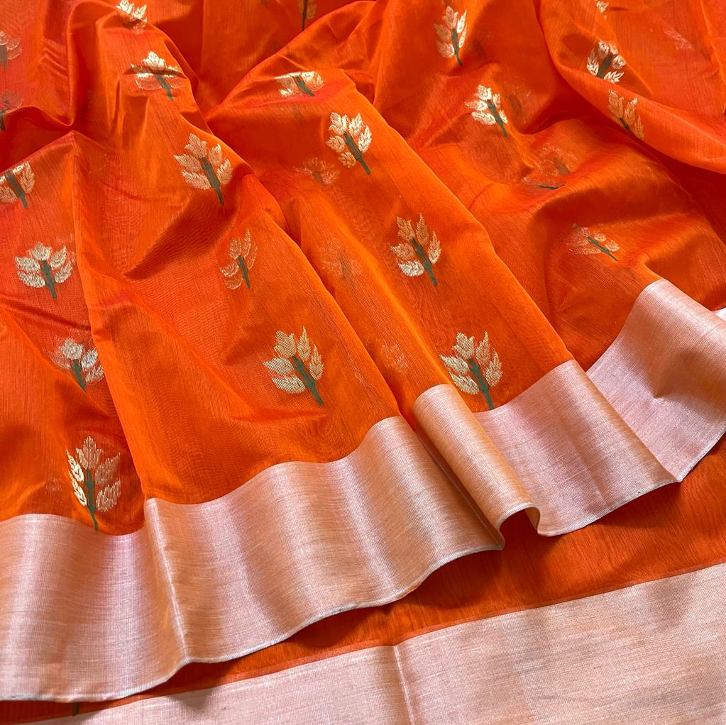 Orange Chanderi saree with flower motifs all over