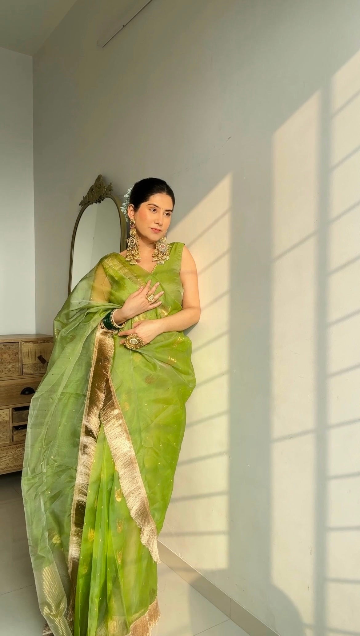 Tropical green chanderi silk saree with zari bootis and chaand bootis all over