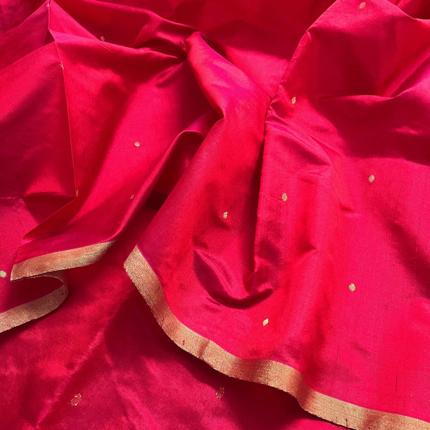 Crimson red chanderi silk saree with zari bootis all over