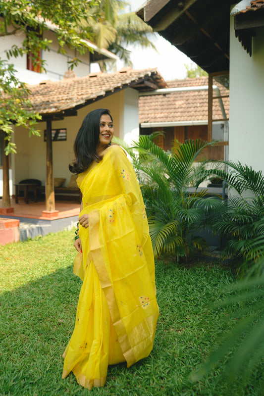 Yellow Chanderi saree with birds on tree motifs all over