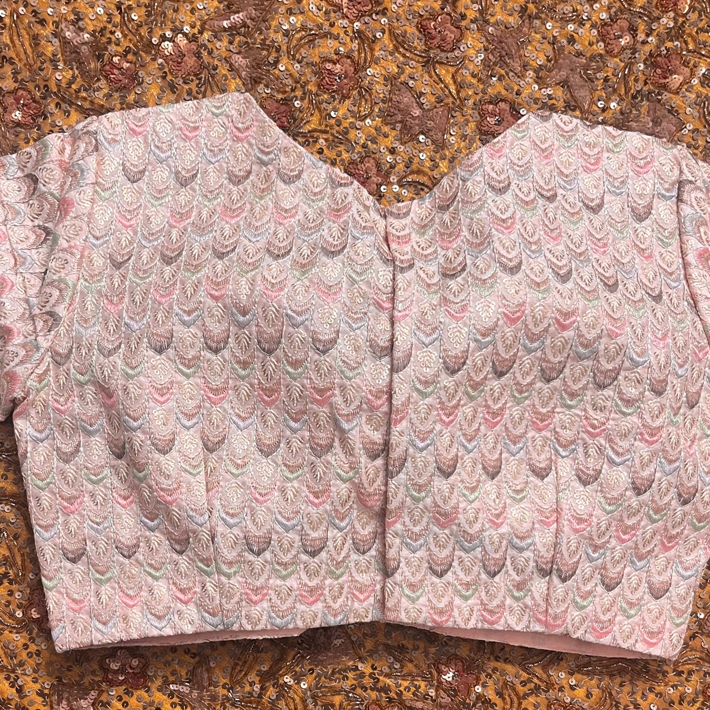 Light pink blouse with threadwork