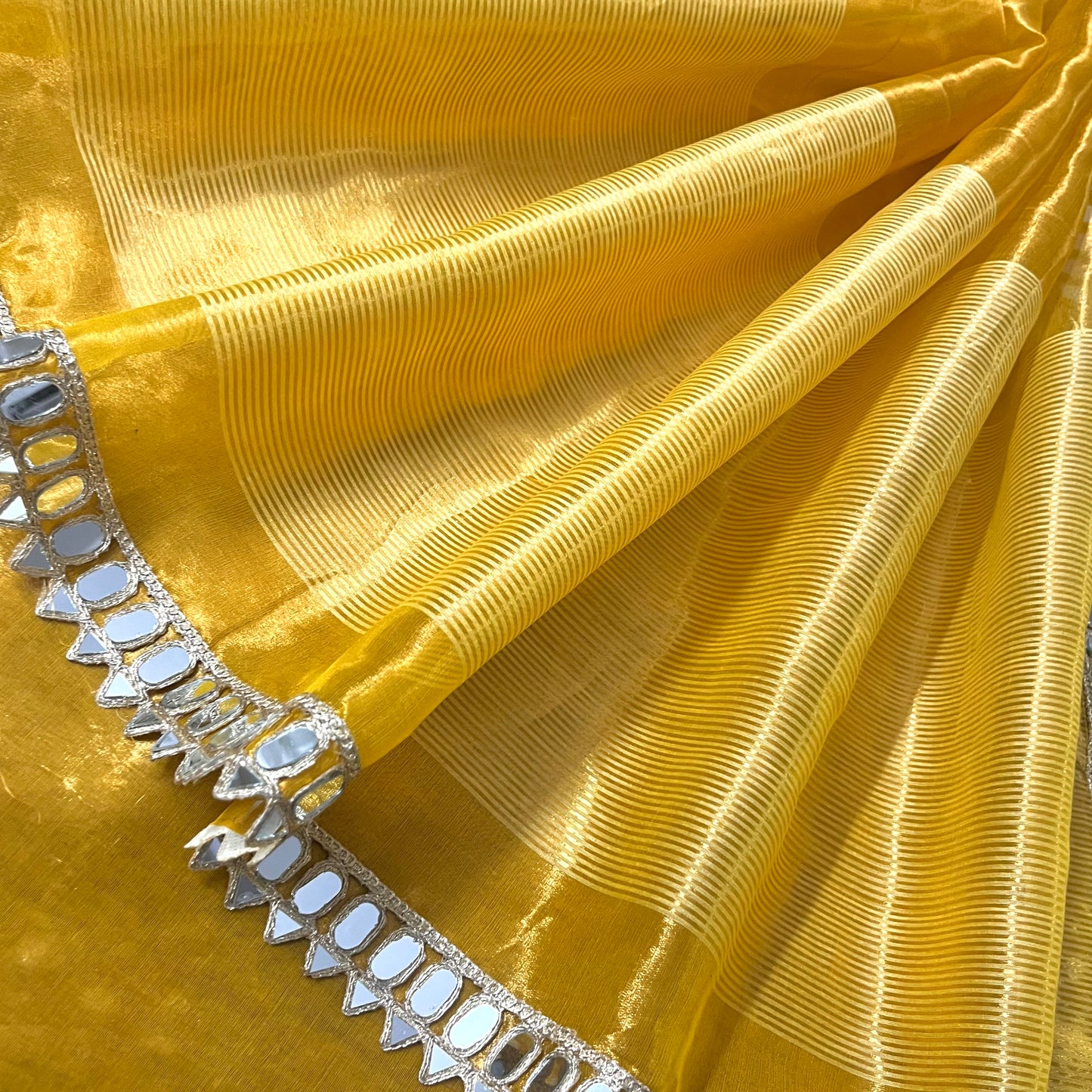 Molten amber gold chanderi tissue silk saree with mirror work border