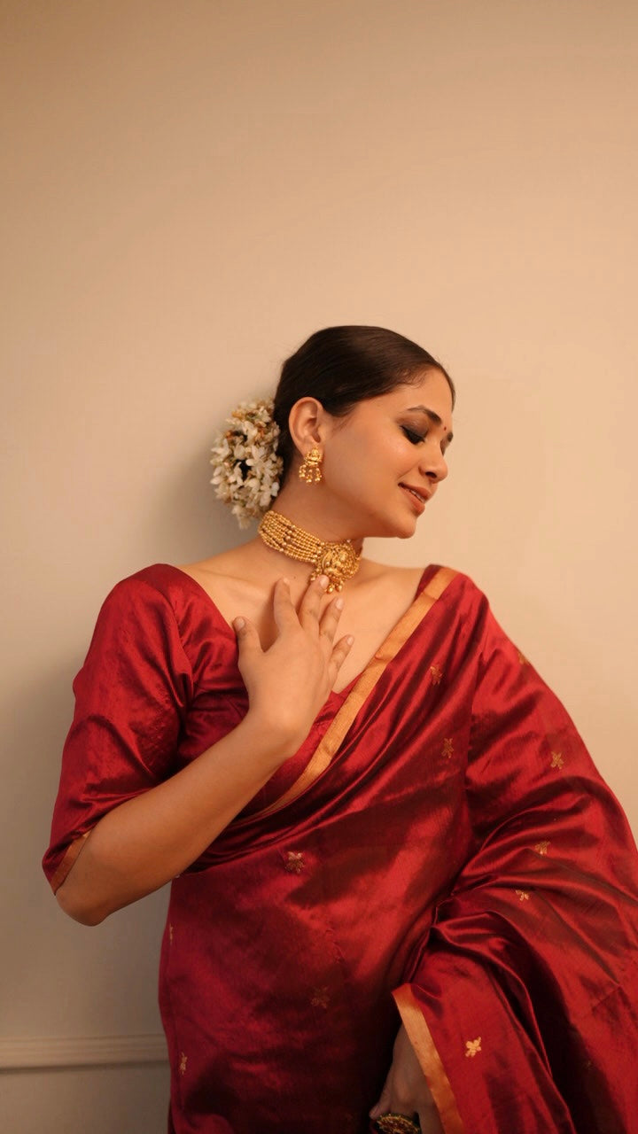 Deep maroon chanderi silk saree with flower bootis all over