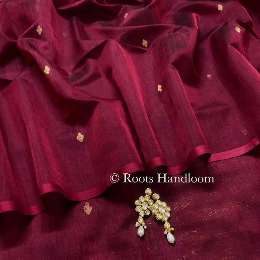 Deep maroon Maheshwari saree with zari bootis all over