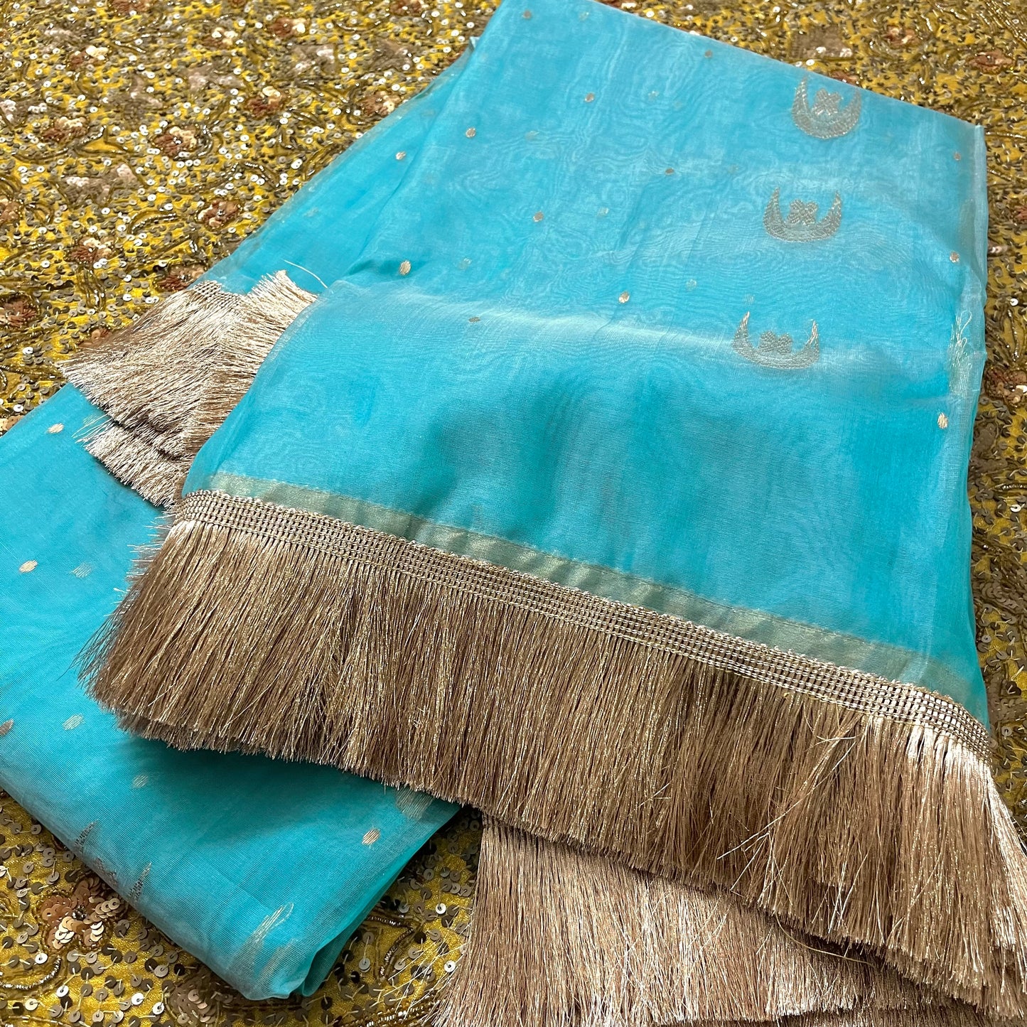 Aqua blue chanderi organza silk saree with zari bootis and chaand bootis all over