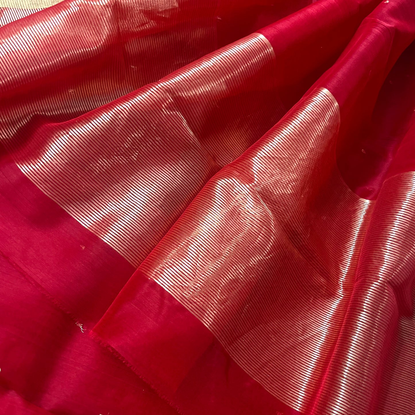 Deep red chanderi organza silk saree with zari bootis all over