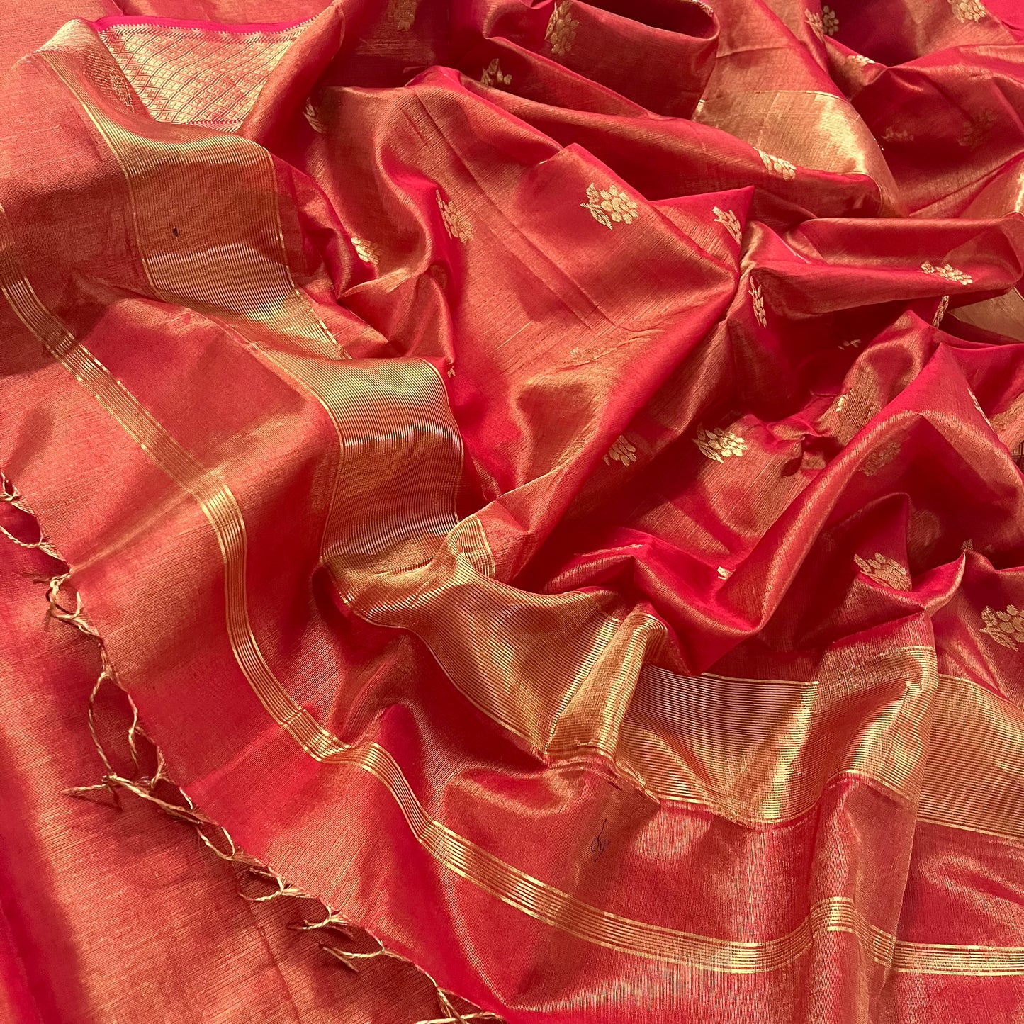 Red maheshwari tissue silk saree with flower motifs all over