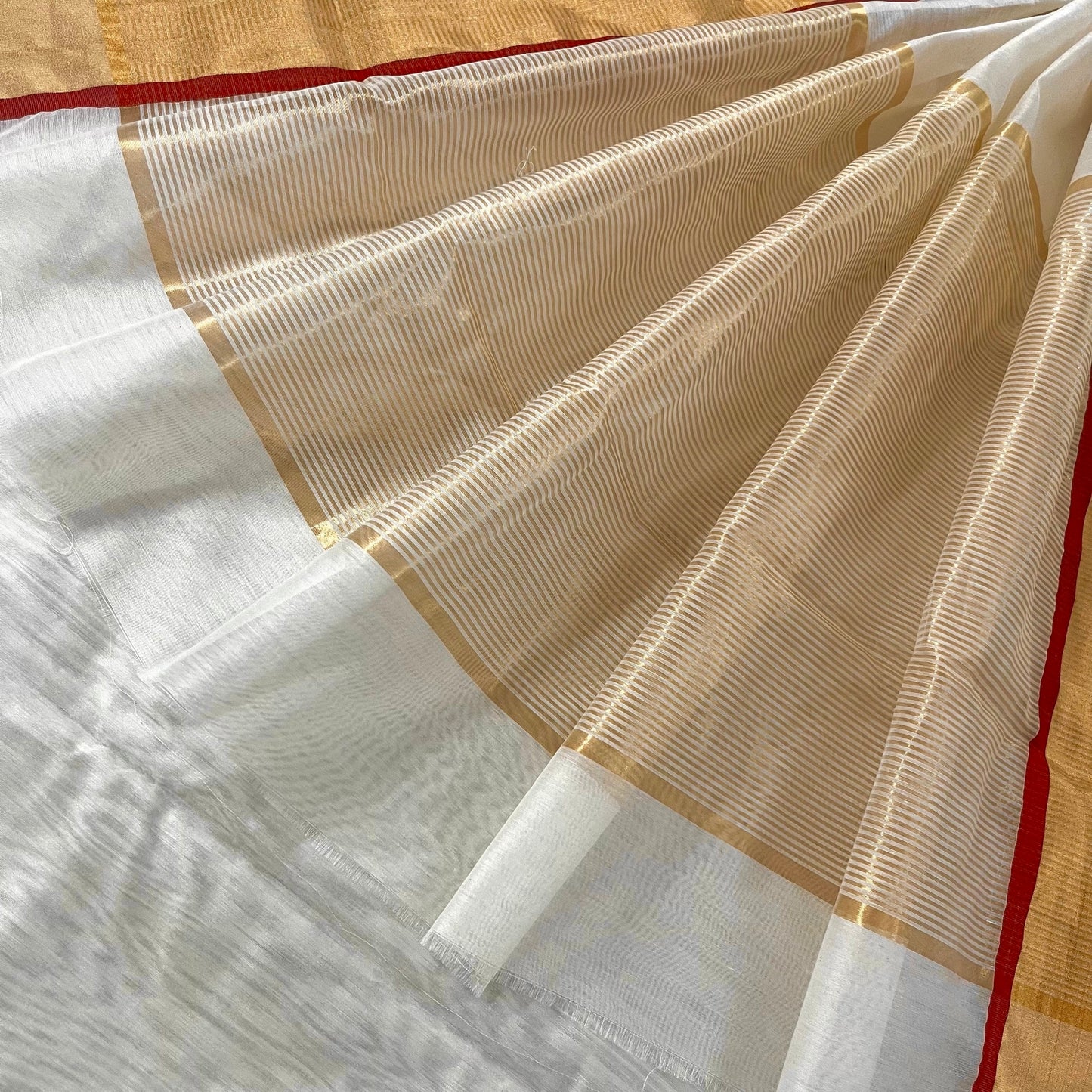 Off white & red maheshwari saree with zari lines on pallu