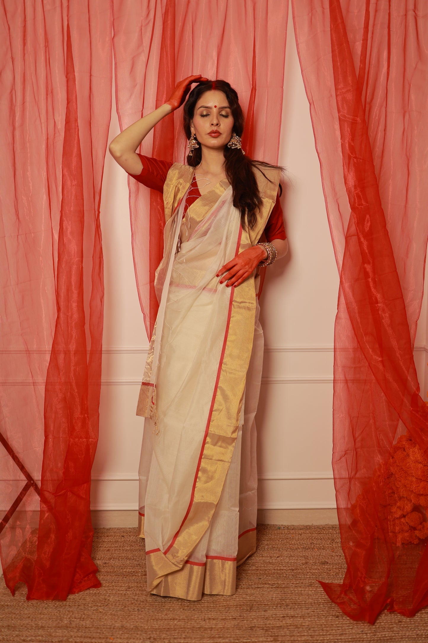 Off white & red maheshwari saree with zari lines on pallu