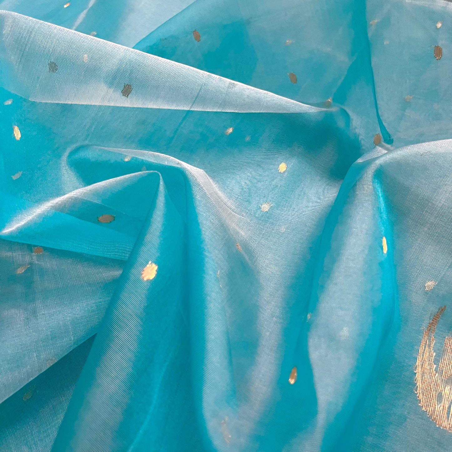 Aqua blue chanderi organza silk saree with zari bootis and chaand bootis all over