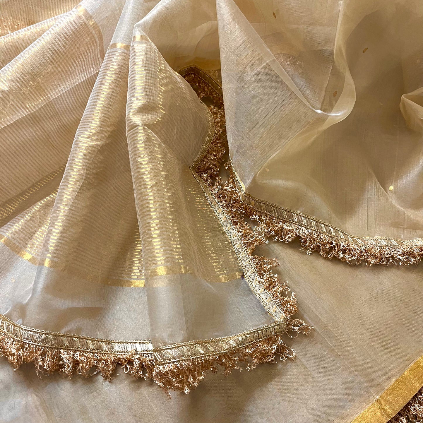 Beige gold Chanderi organza silk saree with zari bootis all over