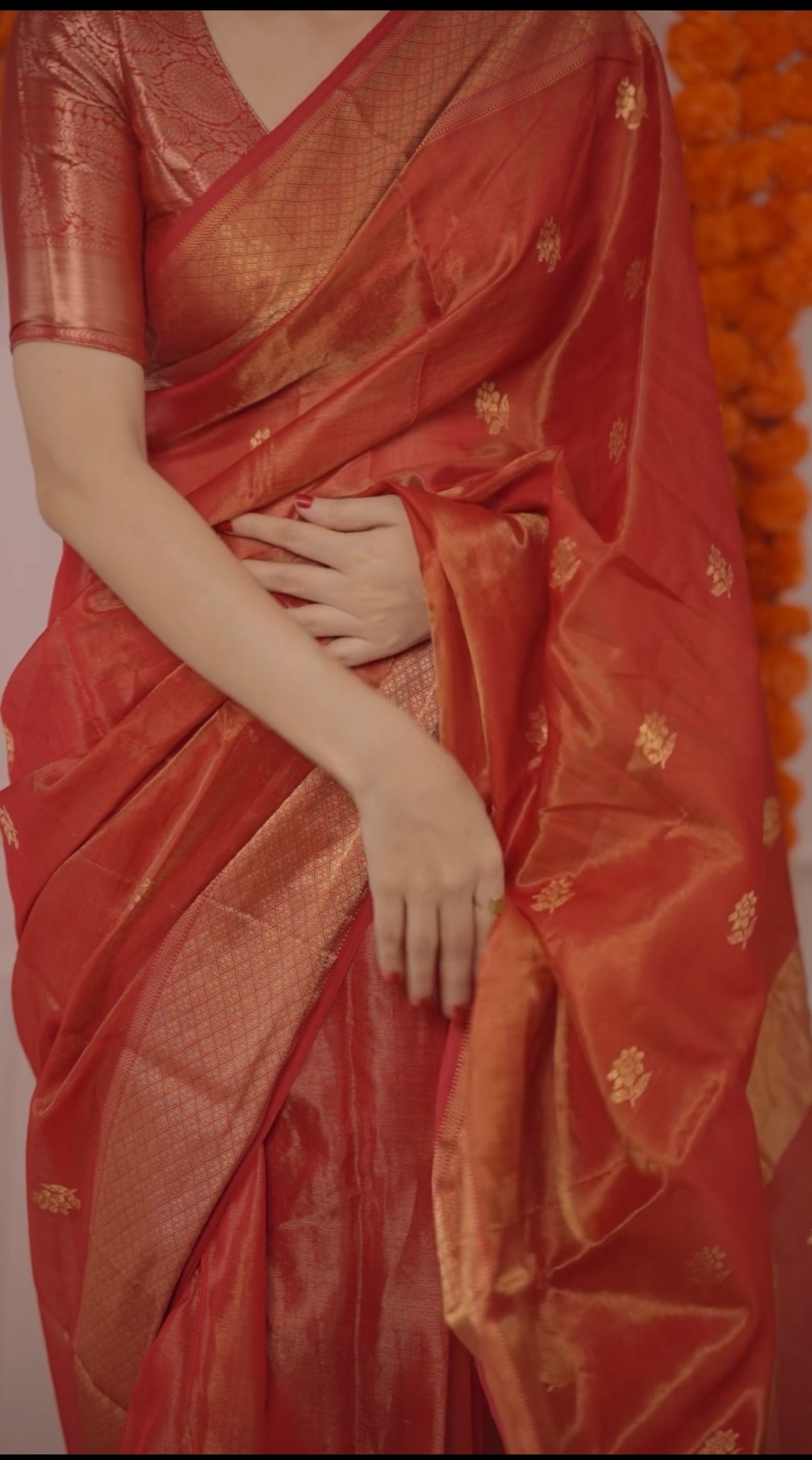 Red maheshwari tissue silk saree with flower motifs all over