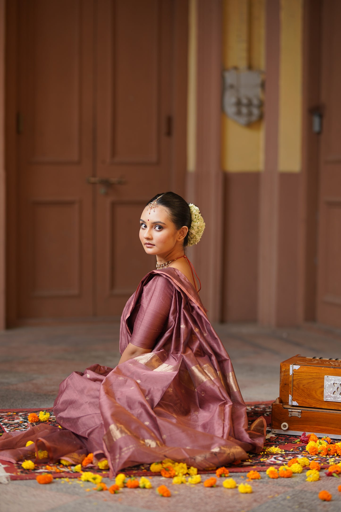 Rust pink maheshwari saree with zari bootis all over